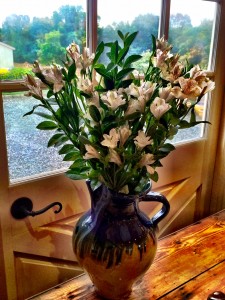 Alstroemeria in beautiful hand-painted clay vase